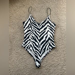 Super soft zebra print onesie